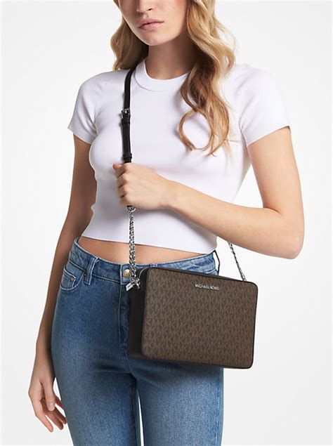 michael kors large crossbody gray magnet|Jet Set Large Signature Logo Crossbody Bag .